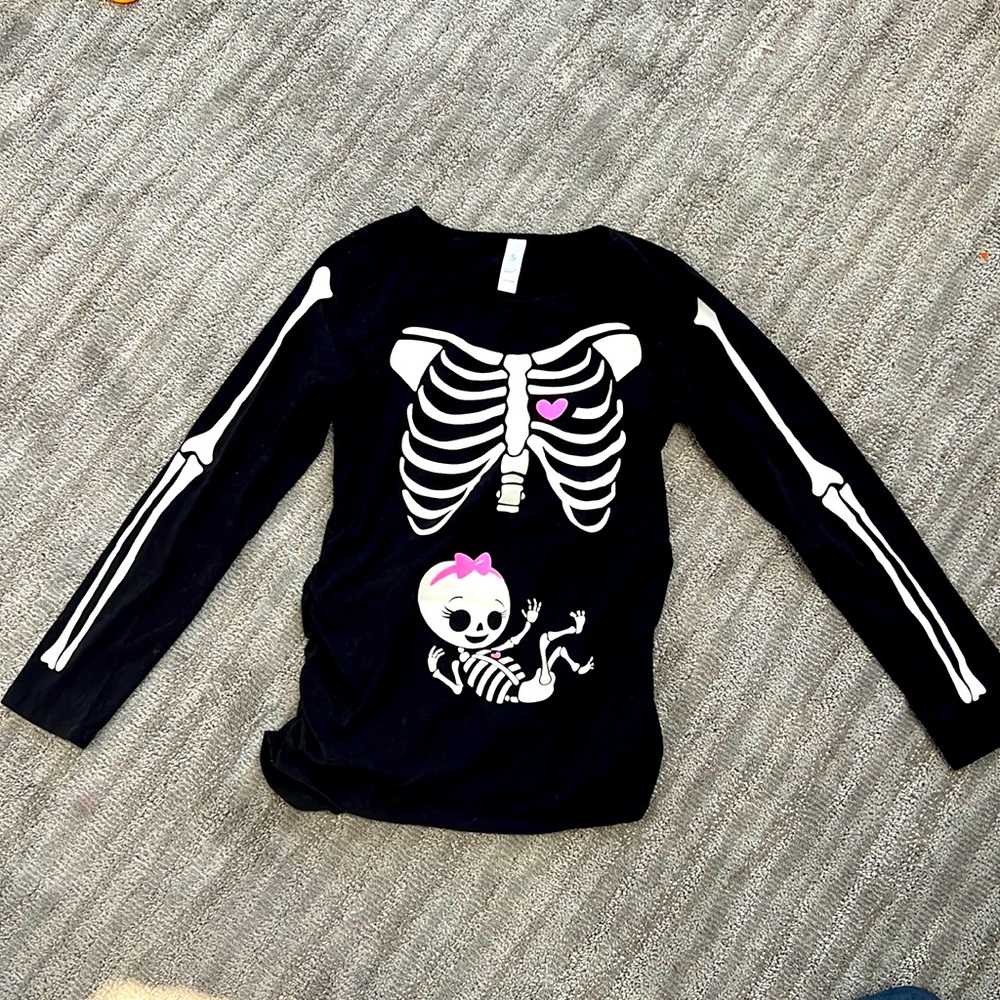 Skeleton with baby girl Halloween Maternity shirt. Glows in the dark!